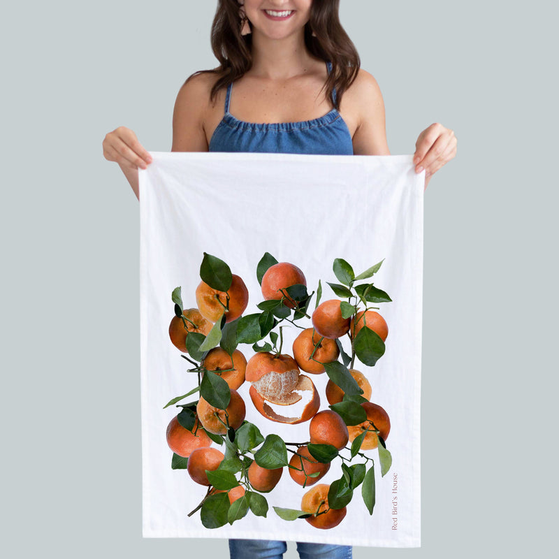 Mandarine kitchen towel. Bright orange mandarines with one recently being peeled as it was about to get eaten. Great for those in tropical areas and gifts to add some color to the kitchen. Photography by Pauline Stevens. Hostess Gift, 19" x 28" (665488621620)