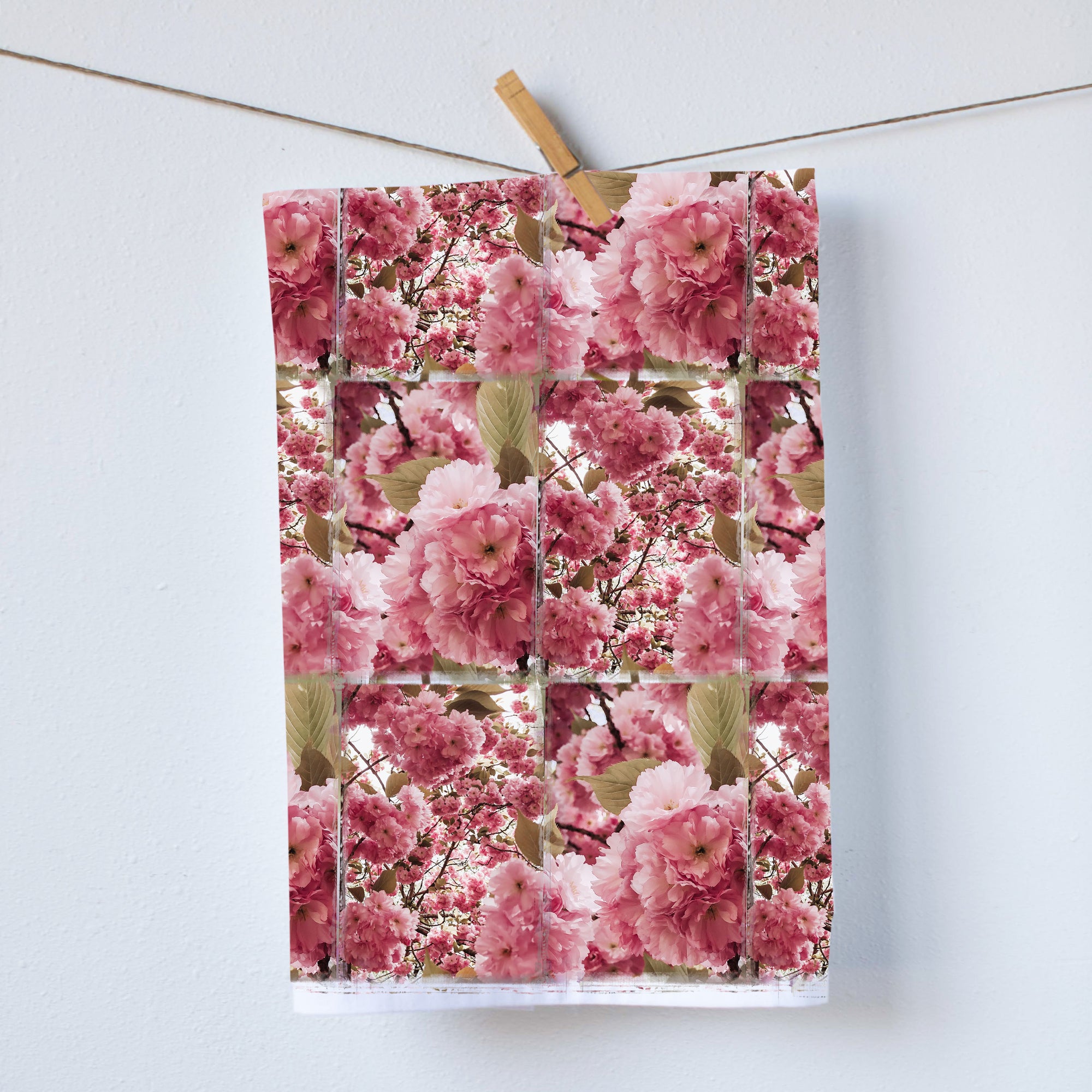 This modern kitchen towel showcases a dynamic assortment of Cherry Blossoms, making it an ideal gift or stylish accent with distinct flair.  Our dish towels are a perfect combination of style and practicality. Size: 19"x 28" Print size 16"x18" 100%  Cotton Gift Ready Packed Machine wash  Exclusively at Red BIrd's House Copyright owned by Pauline Steve