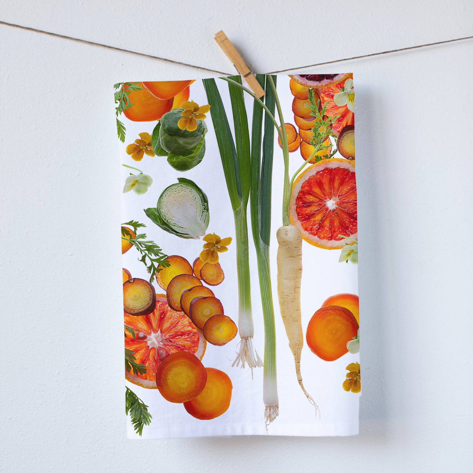 Collage of things found in a farmers market. From carrots to grape fruits. contemporary take with replicated image on kitchen towel. Photography by Pauline Stevens. Hostess Gift, 19" x 28" (408664301)