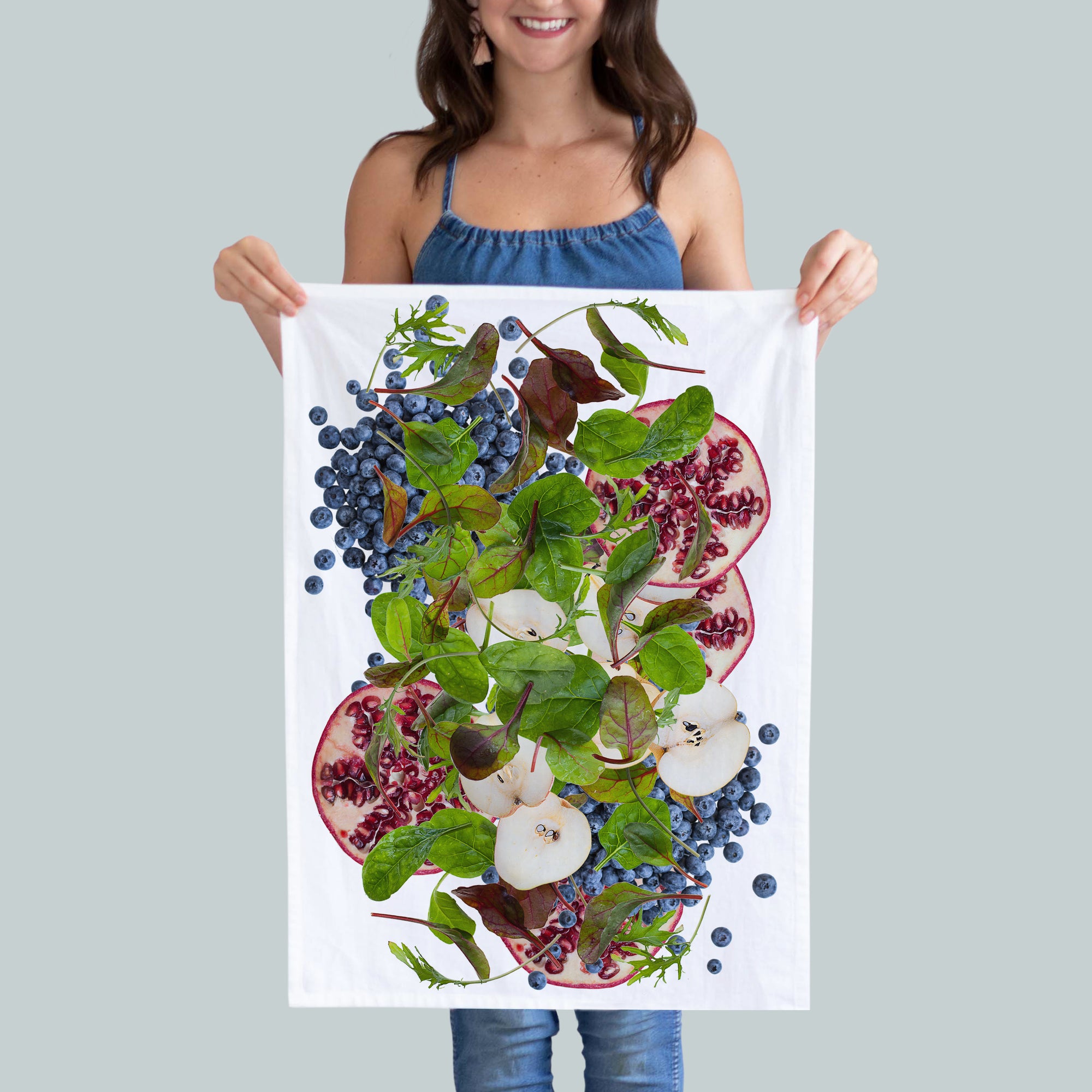 Pomegranate, apple, and blue berries kitchen towel. Few spinach leaves resembling that of a soon to be delicious salad. Hostess gift. Food photography by Pauline Stevens. 19" x 28" (7486055809247)