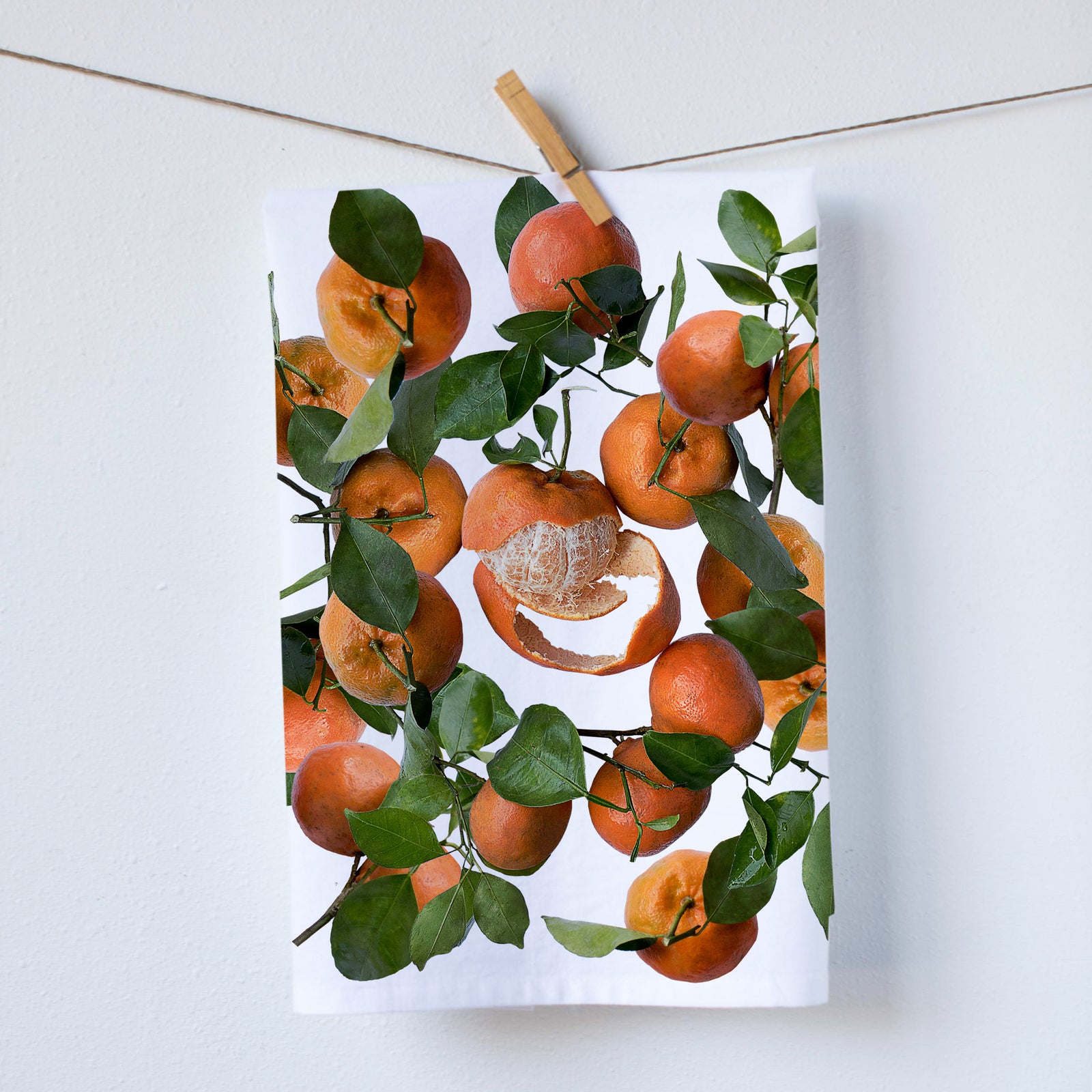 Mandarine kitchen towel. Bright orange mandarines with one recently being peeled as it was about to get eaten. Great for those in tropical areas and gifts to add some color to the kitchen. Photography by Pauline Stevens. Hostess Gift, 19" x 28" (665488621620)