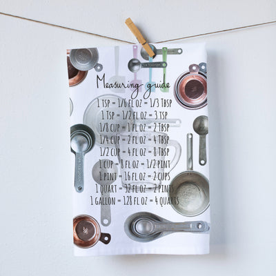 Measuring cups on a kitchen towel. With a measuring guide cheat sheet. Great gift for bakers. Photography by Pauline Stevens. Hostess Gift, 19" x 28" (158487117850)