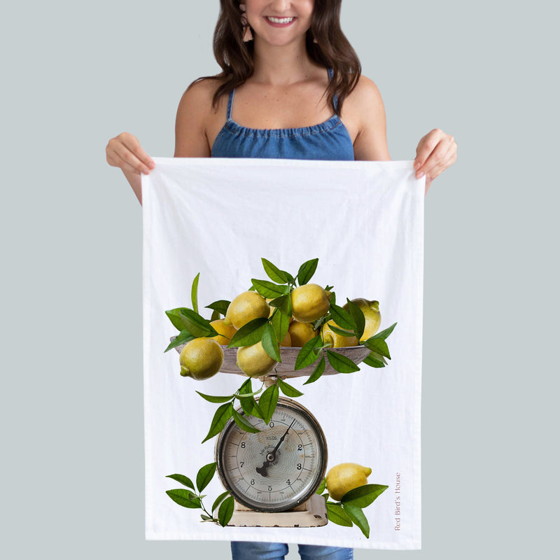 Vintage scale with lemons on top kitchen towel. Vintage scale from the 1920s with lemons overflowing the scale. Photography by Pauline Stevens. Hostess Gift. 19" x 28" (424006893)